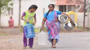 Women collecting water in a drought-hit village under Maharashtra Jal Jeevan scheme