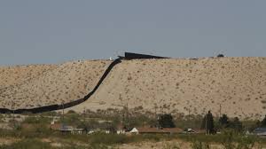 Border militarization in South Texas - military vehicles near Rio Grande