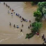 Jharkhand school flood rescue operation with boats saving stranded students from rooftop