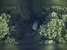 Wreckage of the New Jersey skydiving plane crash site after emergency landing in woods