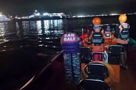 Rescue boats search the area where ferry sinks near Bali