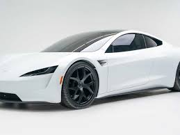 Tesla Mumbai showroom opening image of front entrance with logo